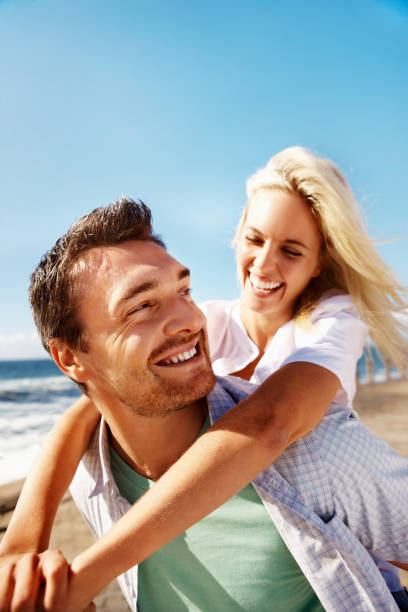 istock Playful couple enjoying the sun 168378308