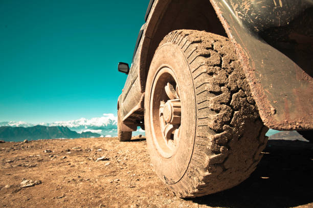 off-road vehicle off-road vehicle on mountaintop,kham,sichuan. extreme terrain stock pictures, royalty-free photos & images