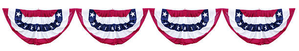 Patriotic Bunting Decorations Patriotic bunting decorations for elections and holidays are hung in a row and isolated with clipping path against a white background. american flag bunting stock pictures, royalty-free photos & images