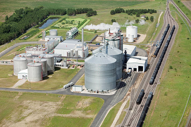 Ethanol Biorefinery Aerial View An Ethanol plant shot from the open window of a small airplane. http://www.banksphotos.com/LightboxBanners/Aerial.jpg ethanol photos stock pictures, royalty-free photos & images