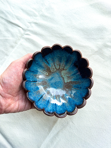 Handmade ceramic scallop bowl in blue glaze