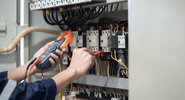 istock Electrician engineer work tester measuring voltage and current of power electric line in electical cabinet control , concept check the operation of the electrical system . 1684060182