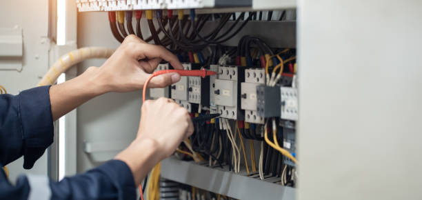istock Electrician engineer work tester measuring voltage and current of power electric line in electical cabinet control , concept check the operation of the electrical system . 1684060186