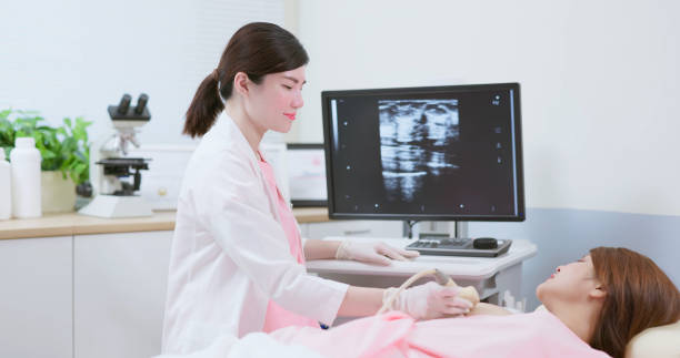 istock woman breast ultrasound examination 1684090619