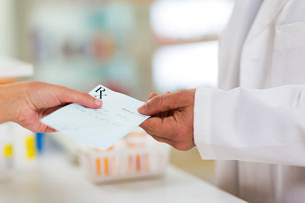 istock Prescription Being Given to Pharmacist 168410000