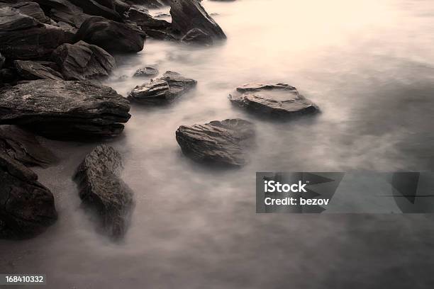 Sonnenuntergang Auf Der Felsigen Strand Stockfoto und mehr Bilder von Bewegungsunschärfe - Bewegungsunschärfe, Bildhintergrund, Blau