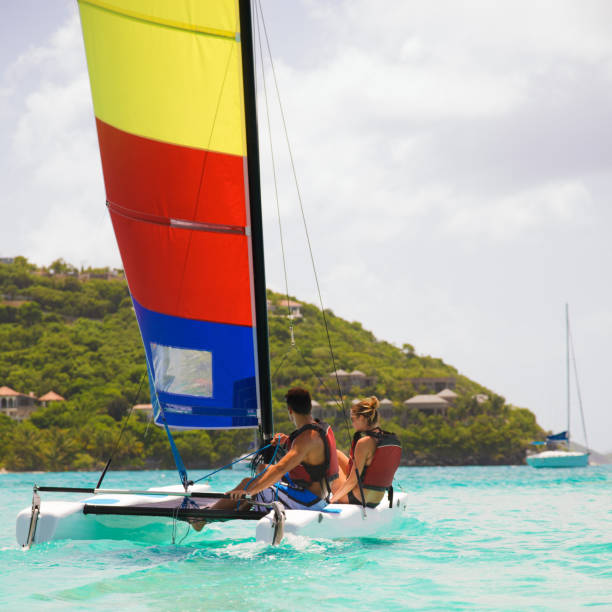 istock couple sailing on a catamaran in the Caribbean 168410351