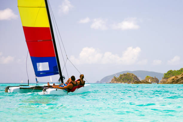 istock couple sailing a catamaran in the Virgin Islands 168410354