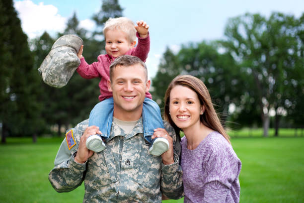 istock Army Family Series: Real American Soldier With Wife & Son 168410371