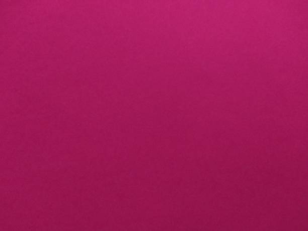 istock Fuchia or Magenta Paper Background 1684113344