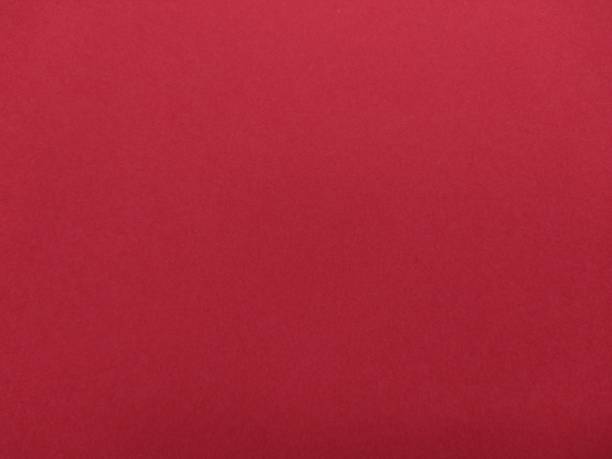 新年のビンテージ赤い色の紙のテクスチャーまたは自然なグランジ背景