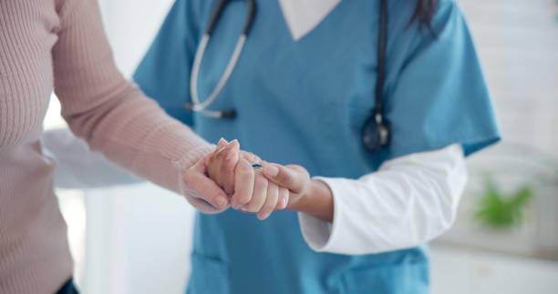 istock Nurse, disabled and old person holding hands for walking support, elderly care or movement disability. Closeup rehabilitation service, retirement home physiotherapy and caregiver help senior patient 1684119491