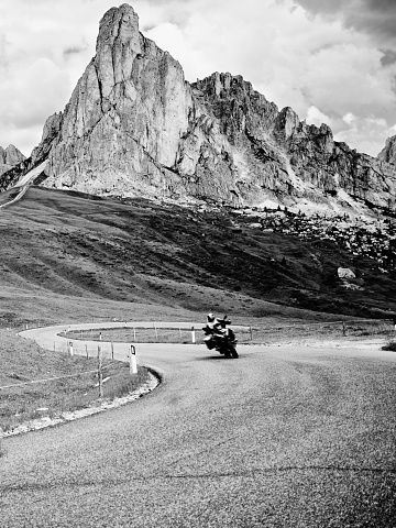 Bikers Riding on Giau Pass Mountain Road, Dolomites, European Alps.