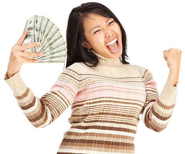 istock Excited Young Woman Holding Money 168412980