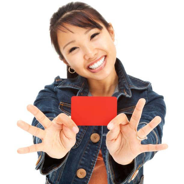 istock Enthusiastic Young Asian Woman with Blank Gift Card 168412988