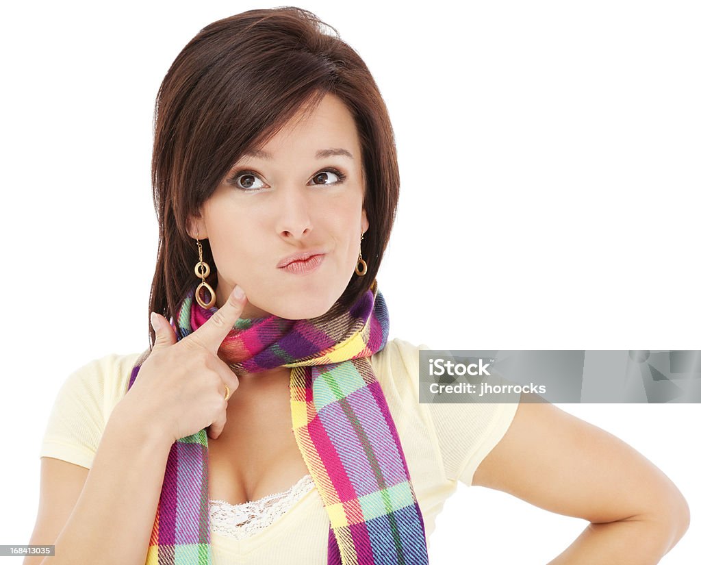 Contemplative Young Woman in Colorful Scarf Photo of an attractive young woman wearing a bright, multi-colored scarf with a contemplative look on her face; isolated on white. 18-19 Years Stock Photo