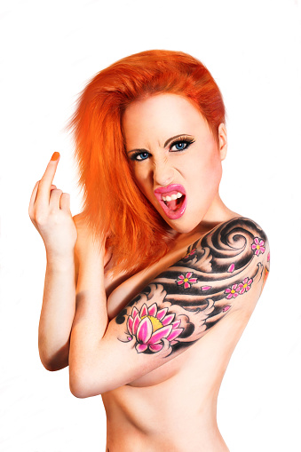 A tattooed woman with attitude