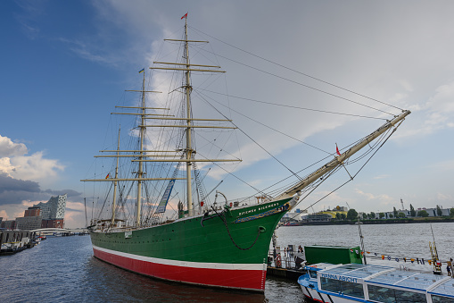 London, United Kingdom - April 24, 2021: Cutty Sark in Greenwich/London. The Cutty Sark tea clipper ship, located in Greenwich on the banks of the River Thames in London. Tourists tour the ship, now a major tourist attraction, following its restoration after a fire in 2007.