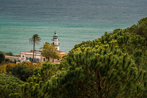 Far de Calella - ancient lighthouse in Calella. Costa del Maresme, Spain, Catalonia