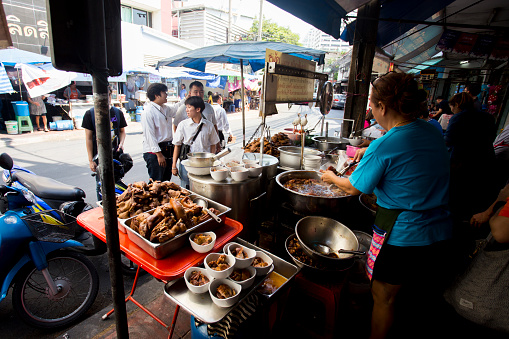 Bangkok, Thailand; 1st January 2023: Street food restaurant in a busy street in Bangkok..