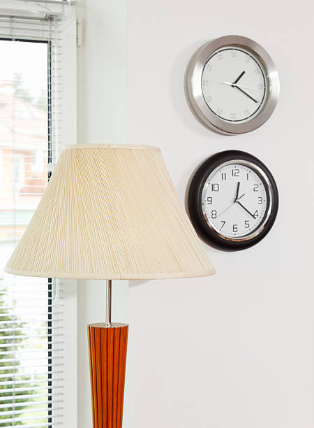 istock Part of modern interior with lamp shade and wall clocks 168416040
