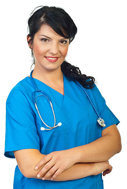 istock Smiling doctor woman with arms folded 168418586