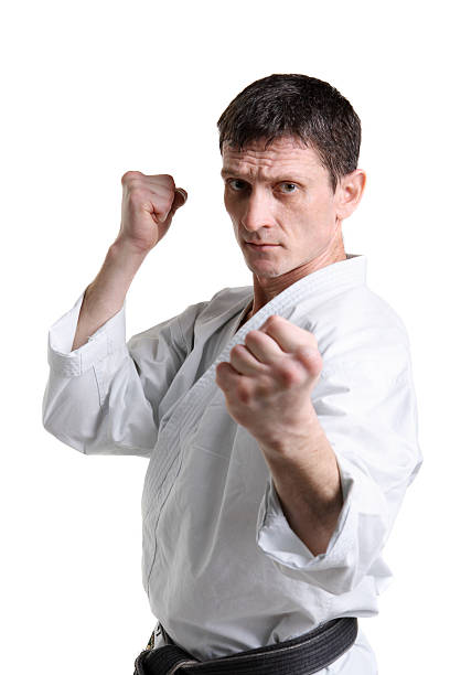 Karate. Man in a kimono stock photo