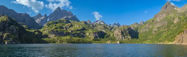 Photo of The Trollfjord or Trollfjorden, Hadsel, Lofoten Islands, Nordland, Norway. The  fjord is only accessible by boat and it is famous for its narrow entrance and steep-sided mountains surrounding it