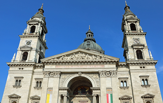 Budapest, B, Hungary - August 18, 2023: St Stephen s Basilica and flags