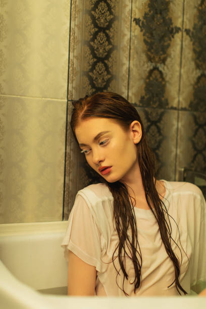asian redhead woman in shower. bathroom. - human hair flowing fashion beauty spa imagens e fotografias de stock