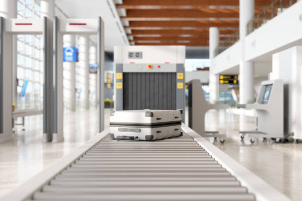 airport security checkpoint with x-ray scanner machine and luggages - airport interior imagens e fotografias de stock