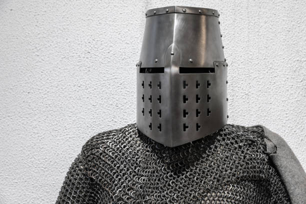 istock Armor of a Medieval knight. Iron helmet and chain mail 1684275172