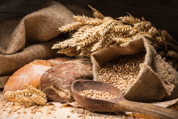 istock Assortment of baked bread on wooden table background 1684281164