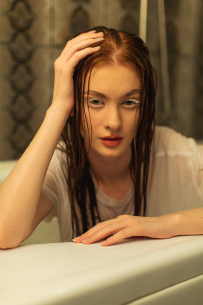 asian redhead woman in shower. bathroom. - human hair flowing fashion beauty spa imagens e fotografias de stock