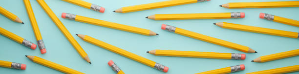 istock Pattern of pencils banner on a green background. 3d render 1684314976