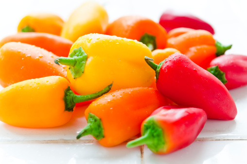 Red, yellow and orange mini chili pepper.