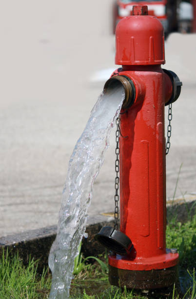 istock big red hydrant and the refreshing water that comes out copious 1684333167
