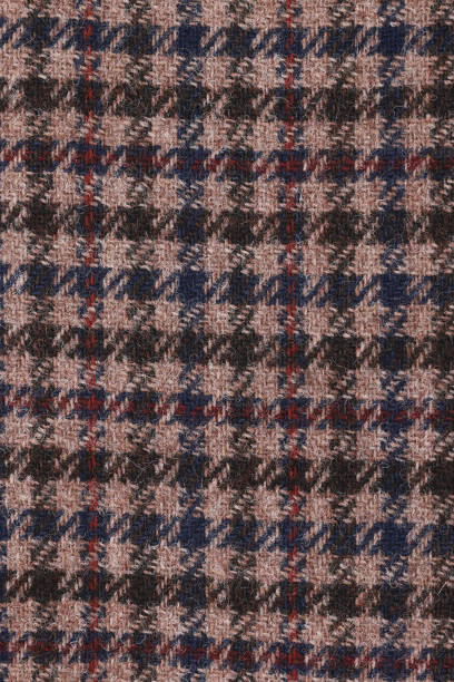 istock Classic tweed, Wool Background Texture. Coat close-up. Expensive suit fabric. Glenurquhart check is made of woolen fabric with a woven twill design of small and large checks. 1684353364