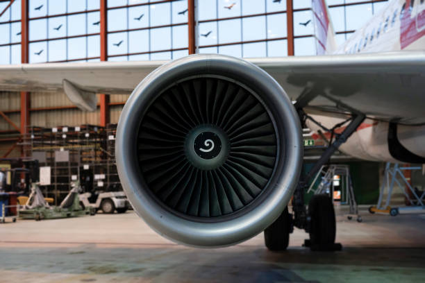 Aircraft maintenance in the hangar. Airplane engine.