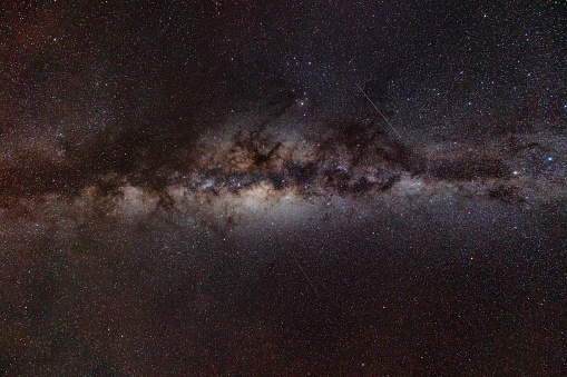 The Milky Way, as seen in the night sky over New Zealand. Two shooting stars can be seen streaking across the sky.