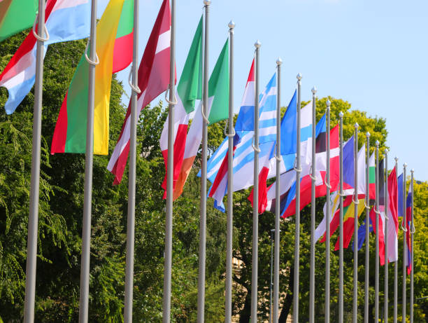 istock colorful world state flags in thread during international event 1684359964