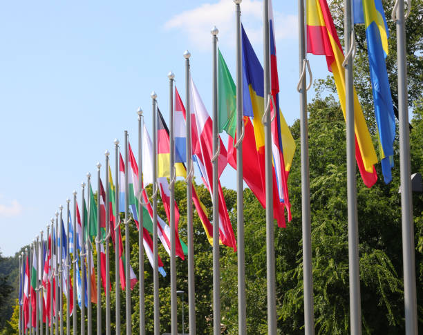 istock colorful world state flags in thread during international outdoor event 1684360488