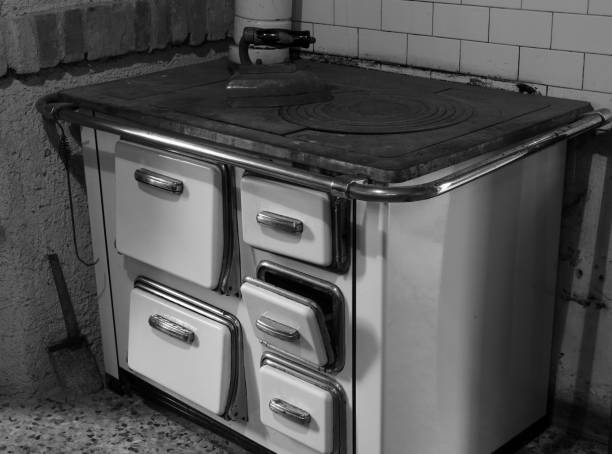 old economical cast iron stove for heating the house using firewood