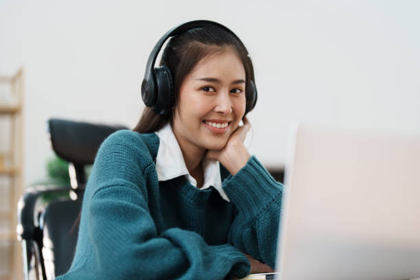 istock Studying online, beautiful Asian female student or student studying online at home 1684384415