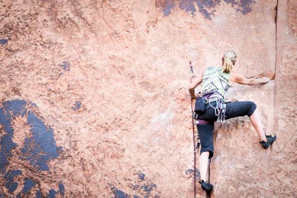 A woman rock climbingFor more Rock Climbing photos...