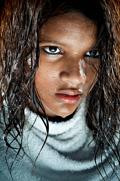 Indian Girl With Wet Hair And Face Looking Intently Stock Photo - Download Image Now - iStock Indian Girl With Wet Hair And Face Looking Intently Stock Photo - Download Image Now - iStock