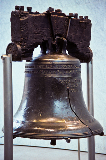 Closeup view of a historic green patina bell at Fort Ross, a former Russian settlement in California - California, USA - November 26, 2023