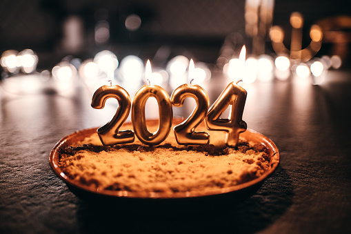 cake with 2024 candle for the new year
