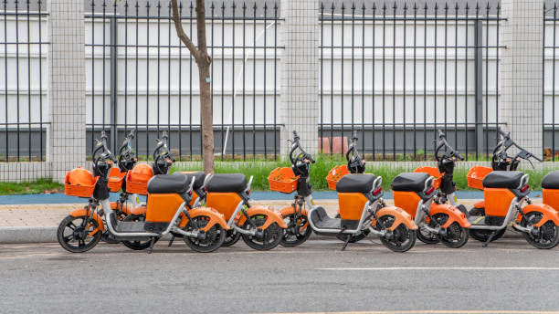 istock Shared electric vehicles parked on the street 1684420106