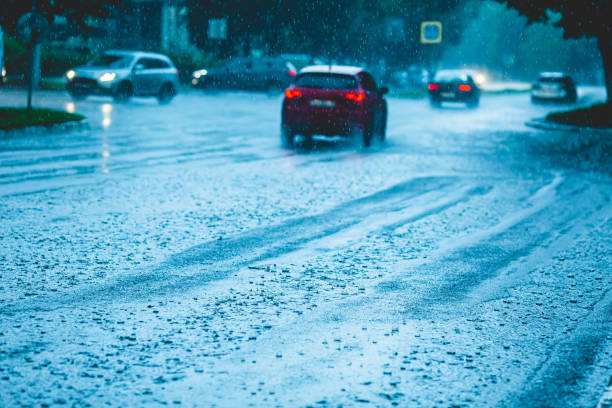 istock Wet asphalt. Raindrops on road. Weather. Background. Rain 1684420661